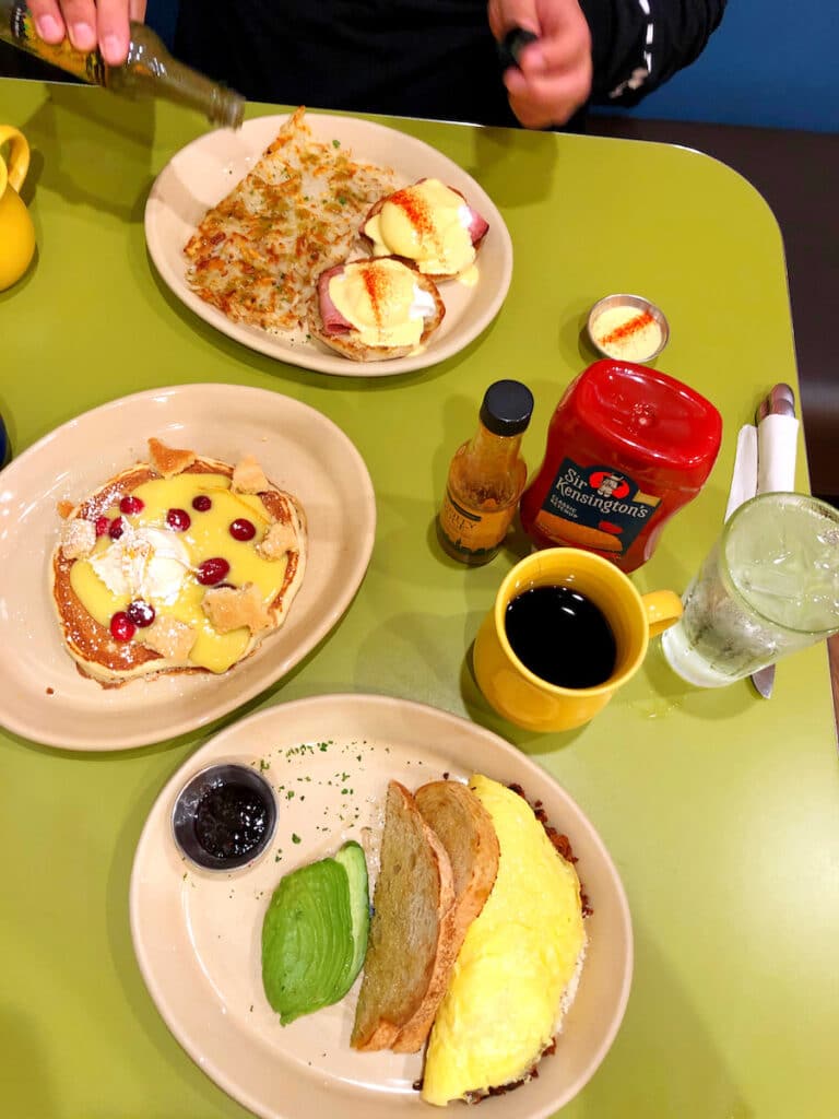 brunch items at Snooze A.M. Eatery Opens in Orange