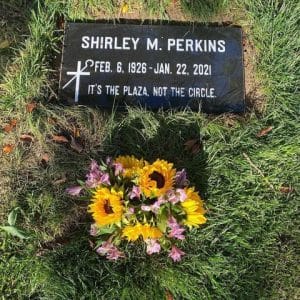 Shirley M. Perkins headstone that says "It's the Plaza, not the Circle."